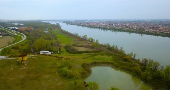 River Po From Above with an Italian City Alongside