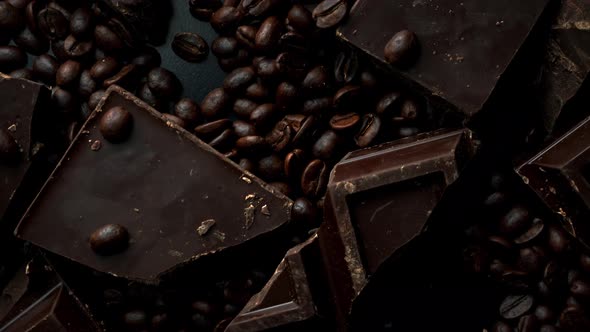 Dark Organic Chocolate and Coffee Beans on Concrete Background