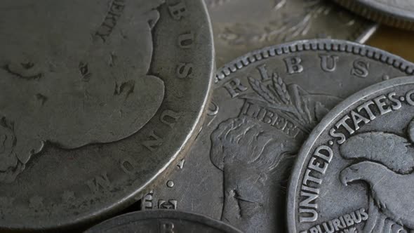 Rotating stock footage shot of antique American coins 