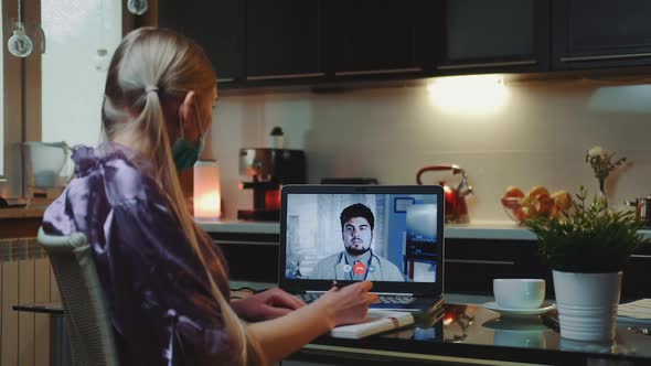 Business Woman Making Video Call to a Doctor and Getting Medical Consultation From Home