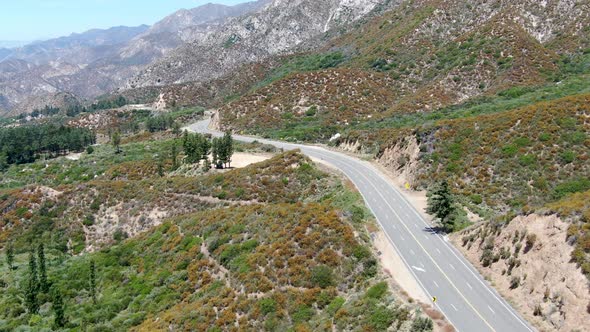 Asphalt Road Bends Through Angeles National Forests Mountain, California, USA