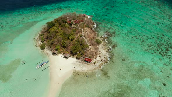 Small Torpic Island with a White Sandy Beach Top View