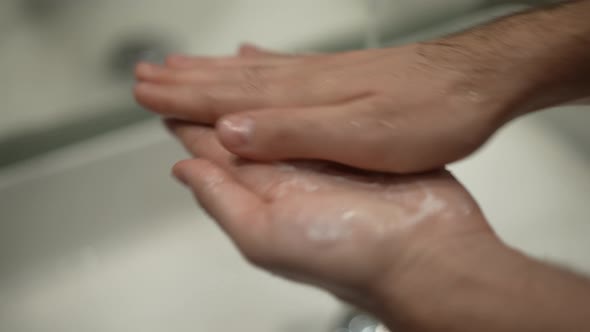 Closeup Male Hands Rubbing Shave Foam in Palms in Slow Motion