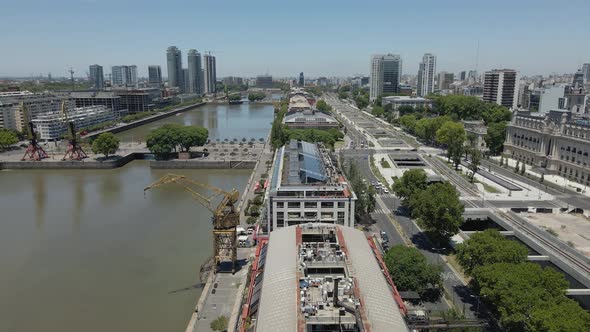 Aerial View Of Puerto Madero Skyscrapers And Rio Plata River In Buenos Aires, Argentina. - Drone Sho