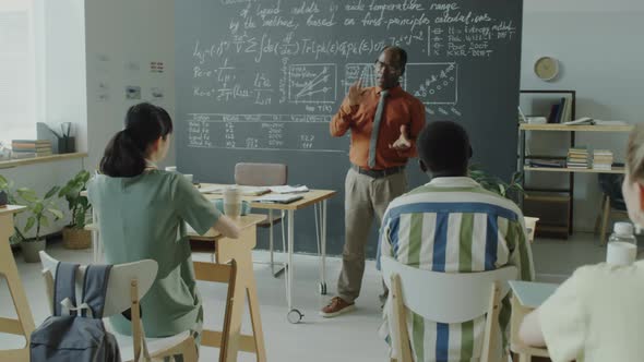 Black Professor Giving Lesson to College Students