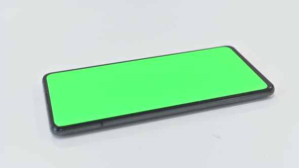 Rotating Green Key Smartphone, Chroma Key