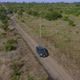 Aerial top view of car driving at countryside - VideoHive Item for Sale