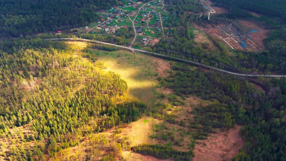 Aerial View of Fields with Forests on a Spring Sunny Day a Magical Landscape with Treetops Lakes in