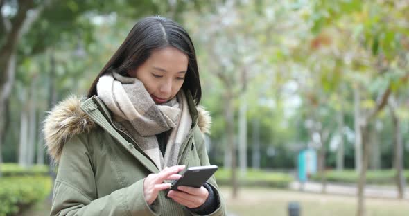 Woman use of smart phone at outdoor