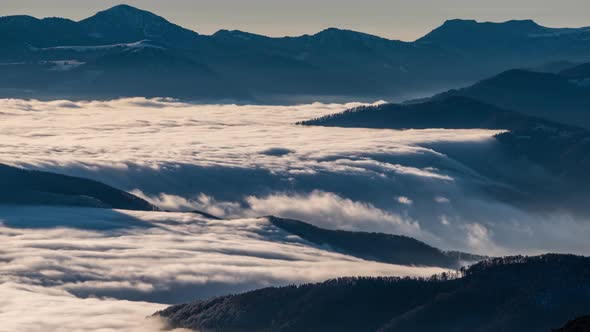 Foggy Clouds Motion Like River in Sunny Mountain Valley Nature