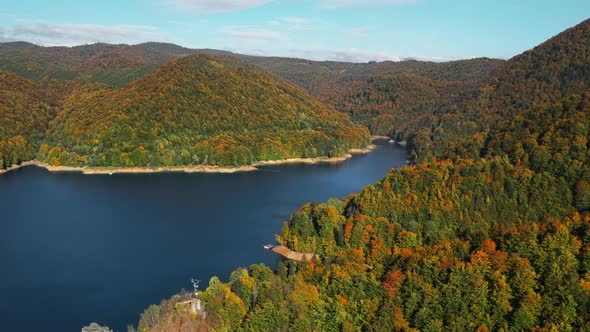 Aerial drone view of nature in Romania. Valley in Carpathian mountains with Vidraru lake