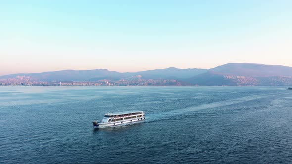 Ferry Boat Floating on Aegean Sea at Sunset Time