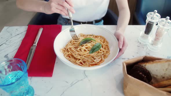 Woman Eating Pasta With Sauce Bolognese