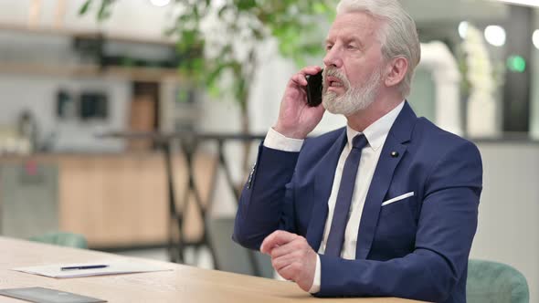 Senior Old Businessman Talking on Smartphone