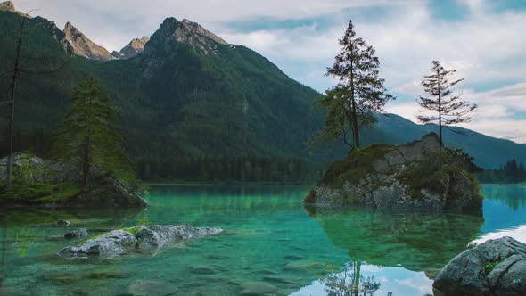 In this Cinemagraph the water of the scenic and beautiful lake Hintersee in Bavaria, Germany is movi