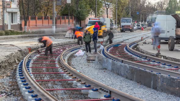 Repair Works on the Street Timelapse. Laying of New Tram Rails on a City Street