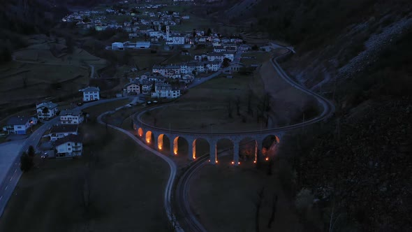 Illuminated Brusio Spiral Viaduct in Switzerland