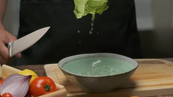 Professional Chef Washes Cabbage Leaves
