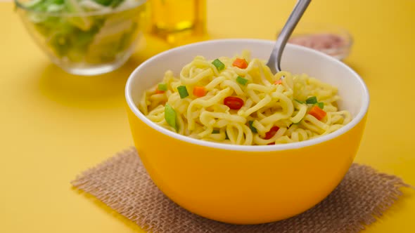 Instant Noodles with Fork Served with Vegetables and Herbs ProRes Uncompressed