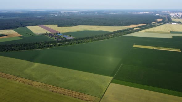 Aerial Drone View Flight Over Different Agricultural Fields