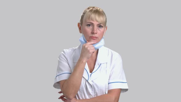 Portrait of Thoughtful Woman Doctor.