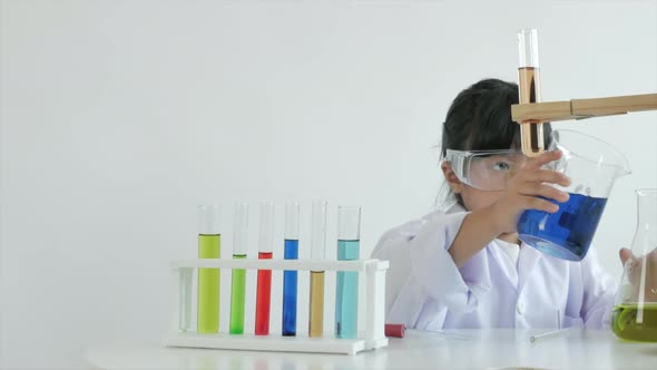 Children play and learn chemical in laboratory