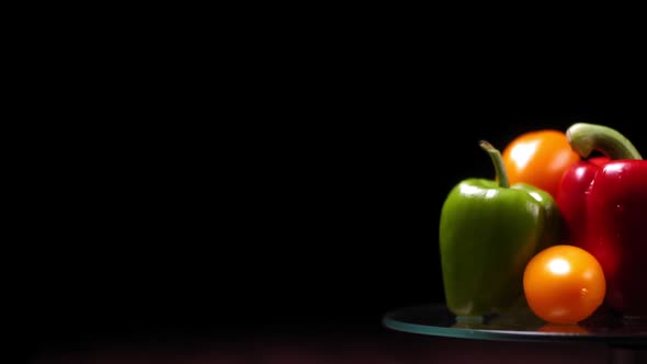 Colorful Vegetables on a Black Background and a Glass Substrate