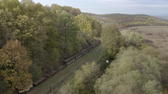 Drone Flight Over the Old Rusty Wagons of the Narrow Gauge Railway