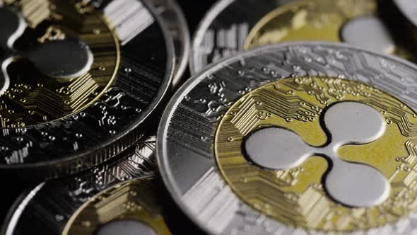 Rotating shot of Bitcoins (digital cryptocurrency) - BITCOIN RIPPLE 