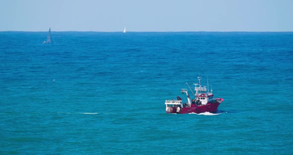 Fishing Boat Sailing in Atlantic Ocean