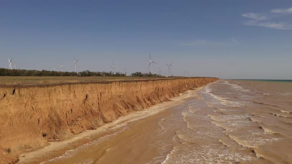 Aerial View of the Wind Turbines Near the Sea