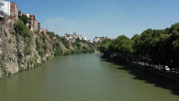 Aerial Drone Shot Flying Over Kura River in Tbilisi