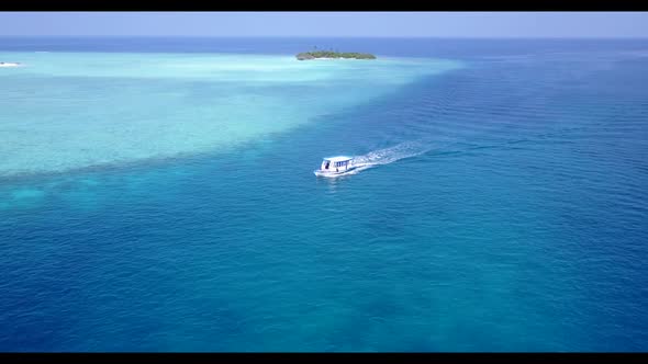 Aerial travel of beautiful island beach lifestyle by blue sea and white sand background of journey a