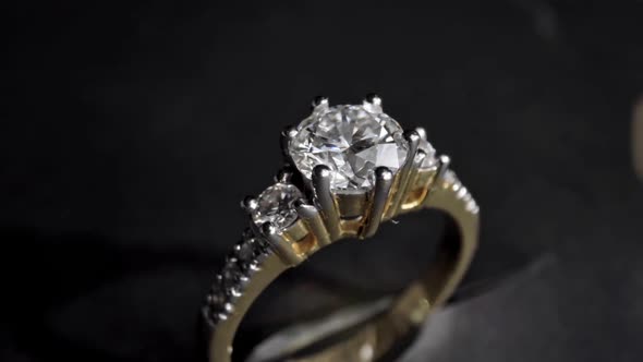 Extreme Detailed of Diamond Ring Close Up Shot While Rotating on Dark Background