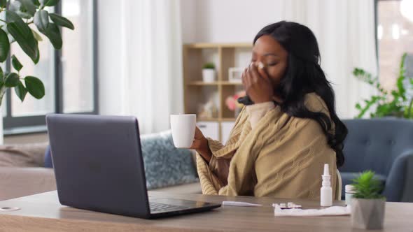 Sick Woman with Tea Having Video Call on Laptop
