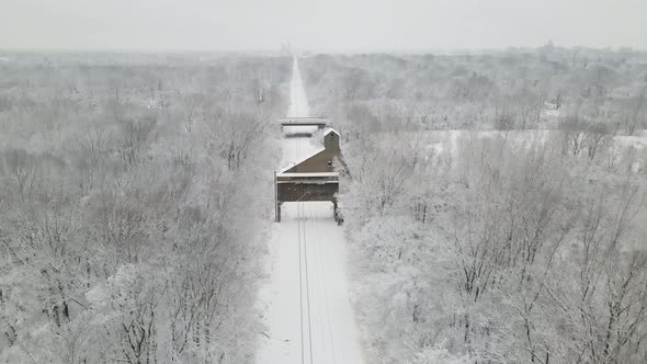 4k drone video of antique coal chute during winter in Lansing Michigan.