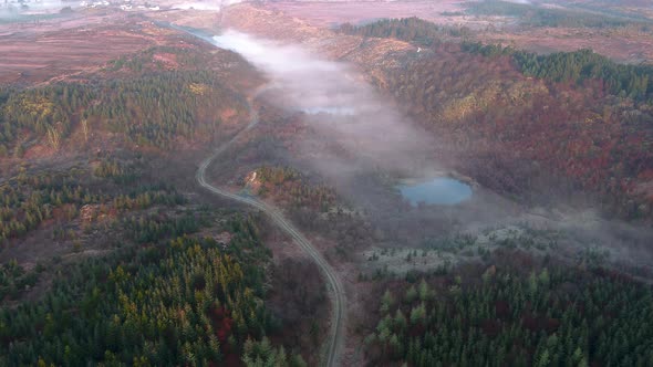 Aerial View of Bonny Glen in County Donegal with Fog  Ireland