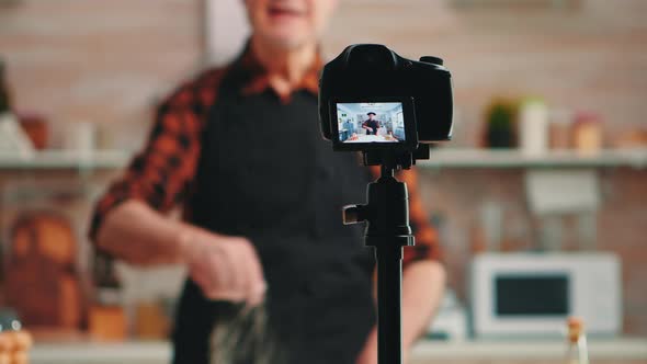 Baker Presenting Food Preparation