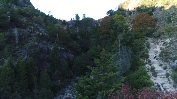 People Visiting Portuguese Cascades, Natural Pools on Steep Rocks, Arado Waterfall