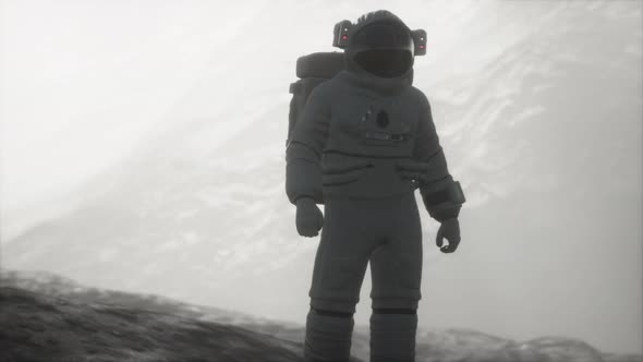 Astronaut on Another Planet with Dust and Fog alt