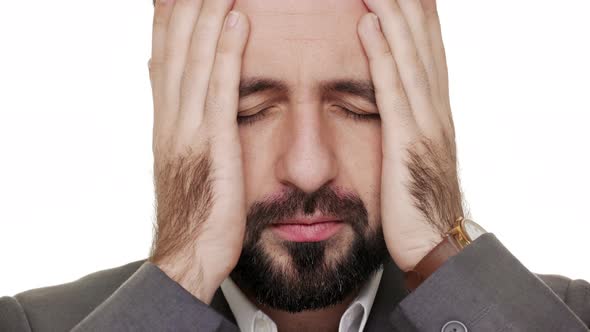 Portrait of Male Worker in Business Outfit Being Frustrated and Exhausted Covering His Face with