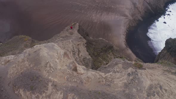 Guy Enjoying Ocean Landscape at Capelinhos Volcano Faial Island Azores