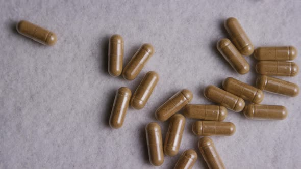 Rotating stock footage shot of vitamins and pills - VITAMINS 0023