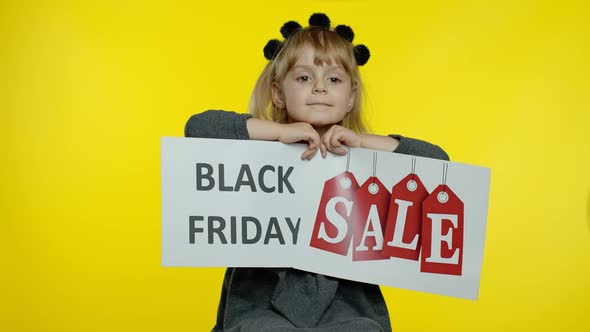 Child Kid Showing Black Friday and Sale Word Discount Advertisement Banners. Low Prices, Shopping