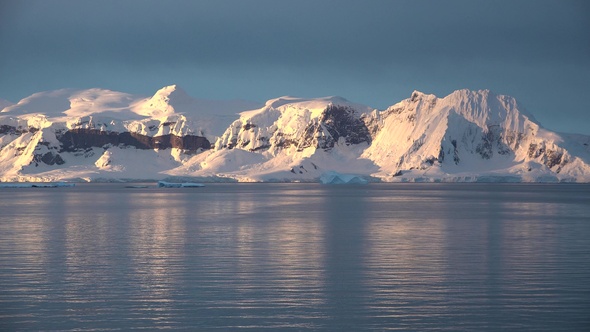 Arctic landscape with mountains, icebergs and glaciers. Climate Change and Global Warming