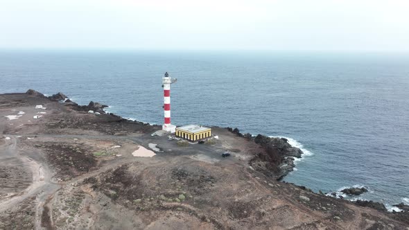 Tenerife Canary Islands Lighthouse at the Atlantic Ocean Alog the Volcanic Cliffs Rocky Coastline