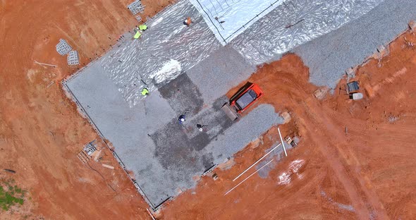 Preparation for Pouring Concrete with Excavator Bucket Working in Leveling Gravel the Building