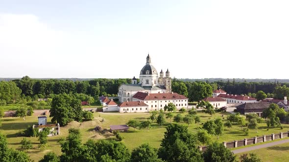 Pazaislis monastery complex building with majestic dome in ascending drone view