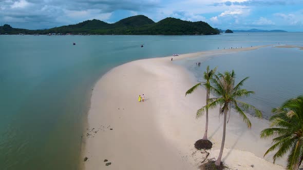 Couple Men and Women Walking on the Beach at the Island Koh Yao Yai Thailand Beach with White Sand