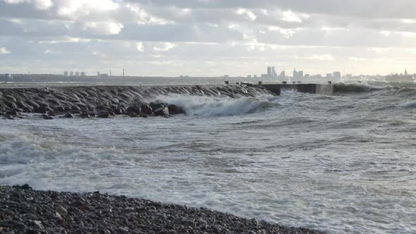 Stormy Sea and Waves Crashing to the Pier